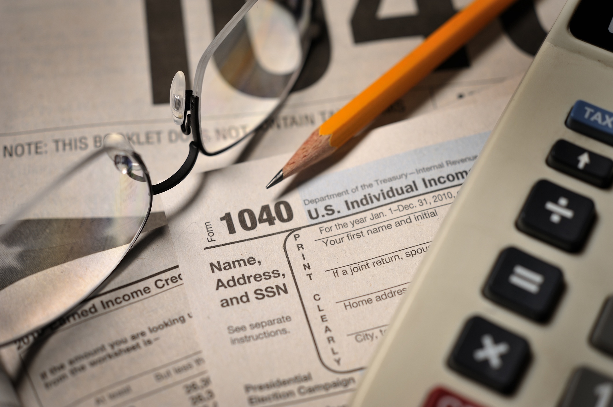Filing taxes on IRS Form 1040 close-up view